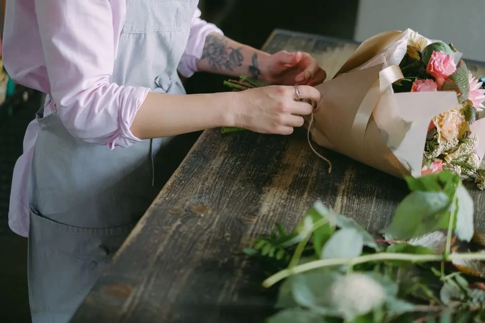 Florist hands arranging a bouquet